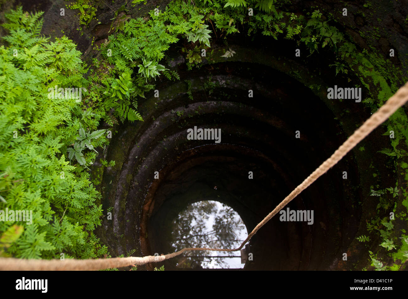 Hand dug water well in kerala India Stock Photo