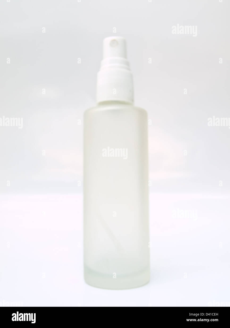 A glass spray bottle isolated on white background Stock Photo - Alamy