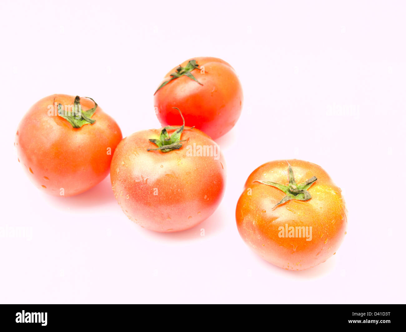 Fresh tomatoes isolated on white background Stock Photo