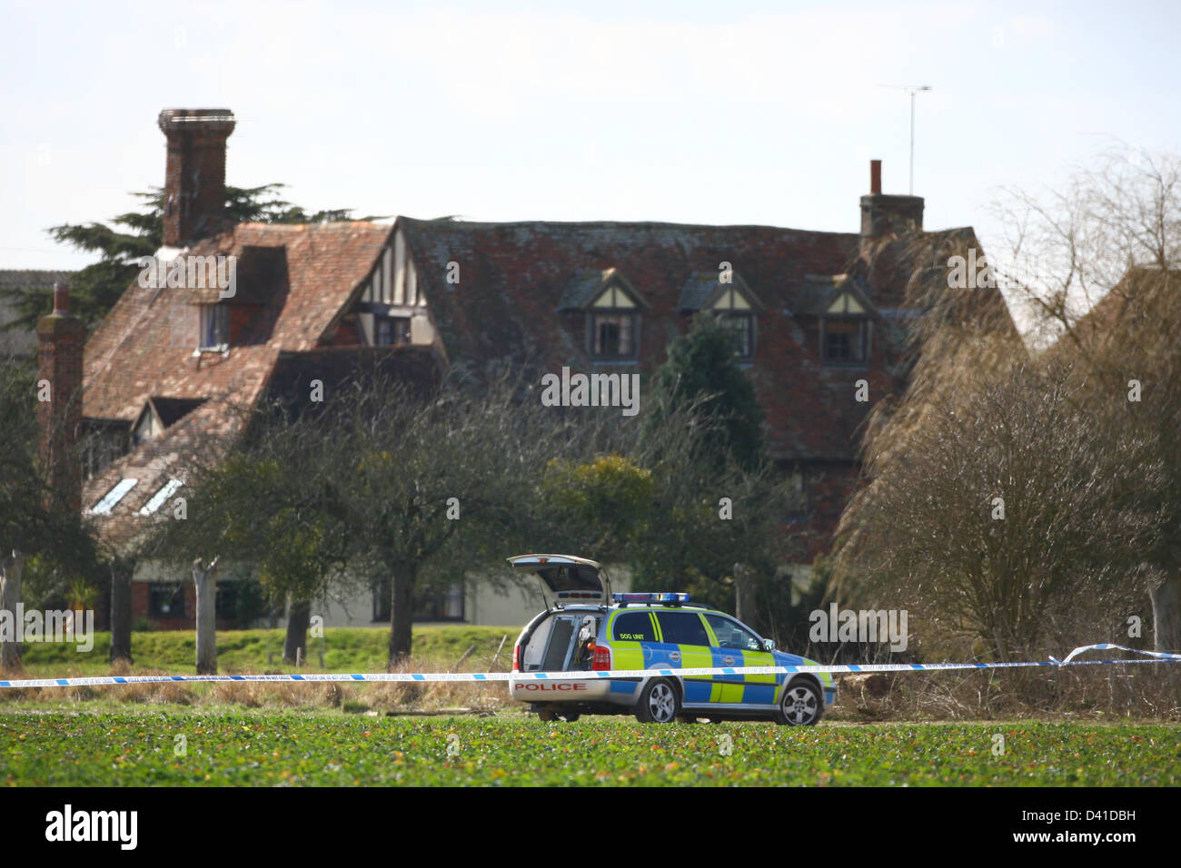 Police search Elderden Farm in connection with the £53m Securitas Depot Robbery. The Tudor farmhouse in Staplehurst is where the Dixons were held hostage and where the £53 million was divided. Owner of the farm John Fowler claimed he was asleep at home at the time and has been cleared of all charges. Stock Photo