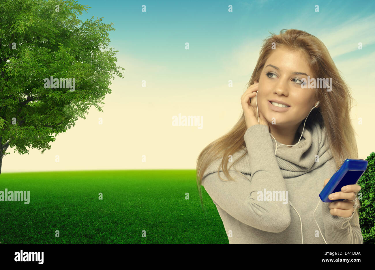 Woman enjoying listening music Stock Photo