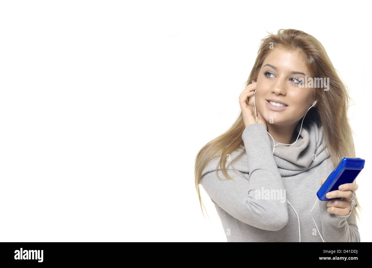 Woman enjoying listening music Stock Photo