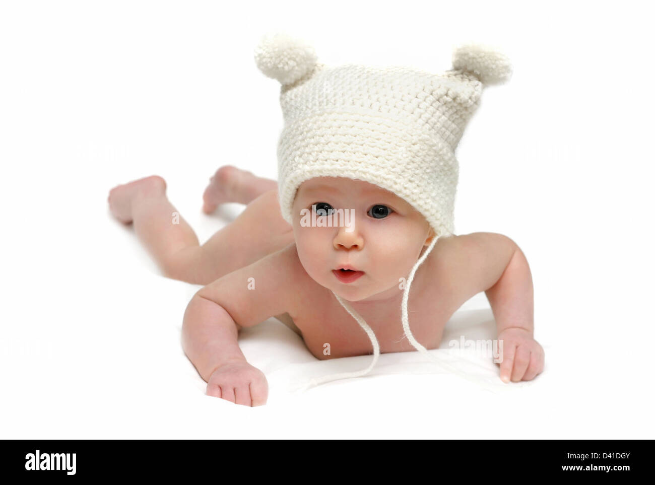 Newborn baby in the cap isolated Stock Photo Alamy