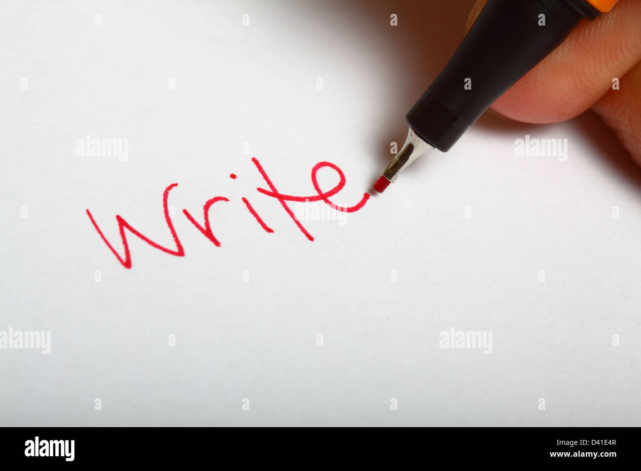 The word write in red ink Stock Photo Alamy