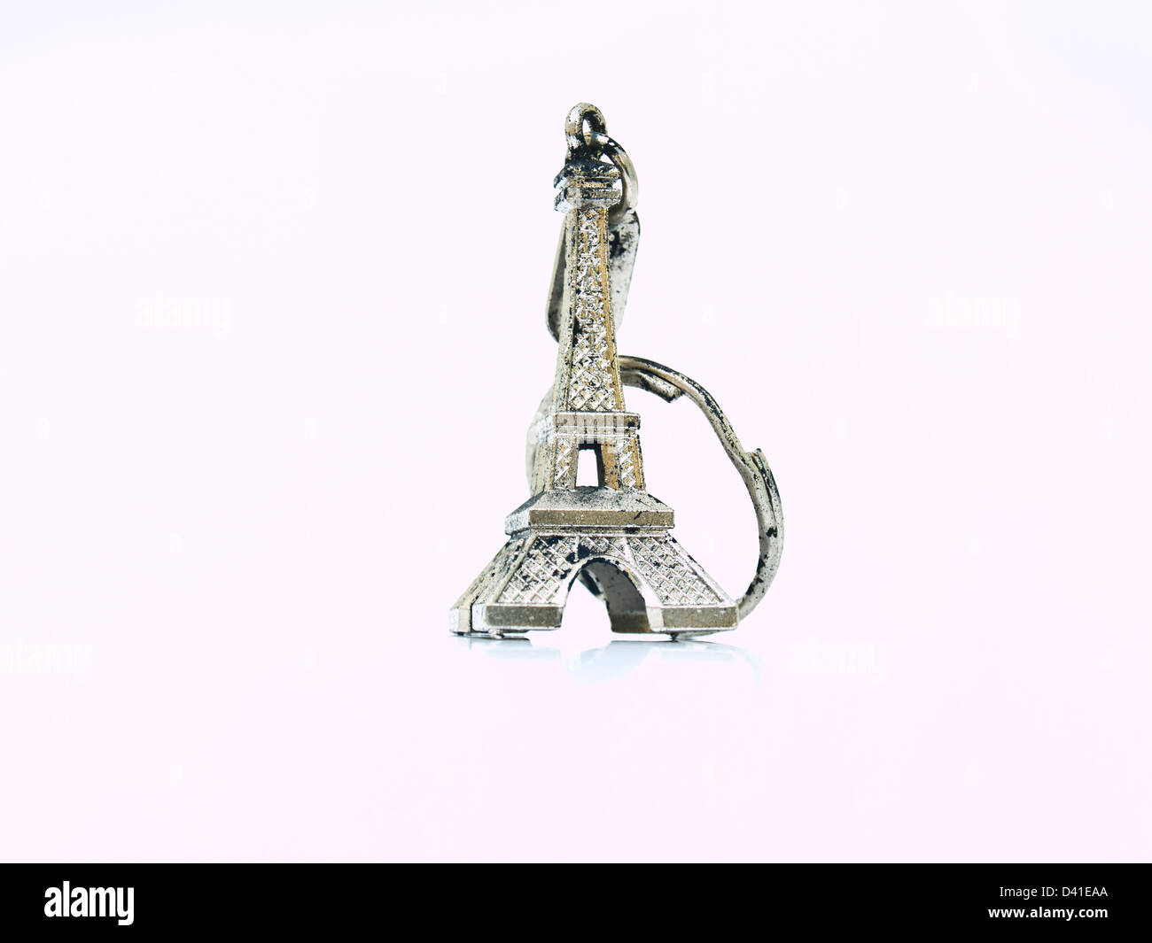 Eifel tower key-chain isolated on white , souvenir from France Stock Photo