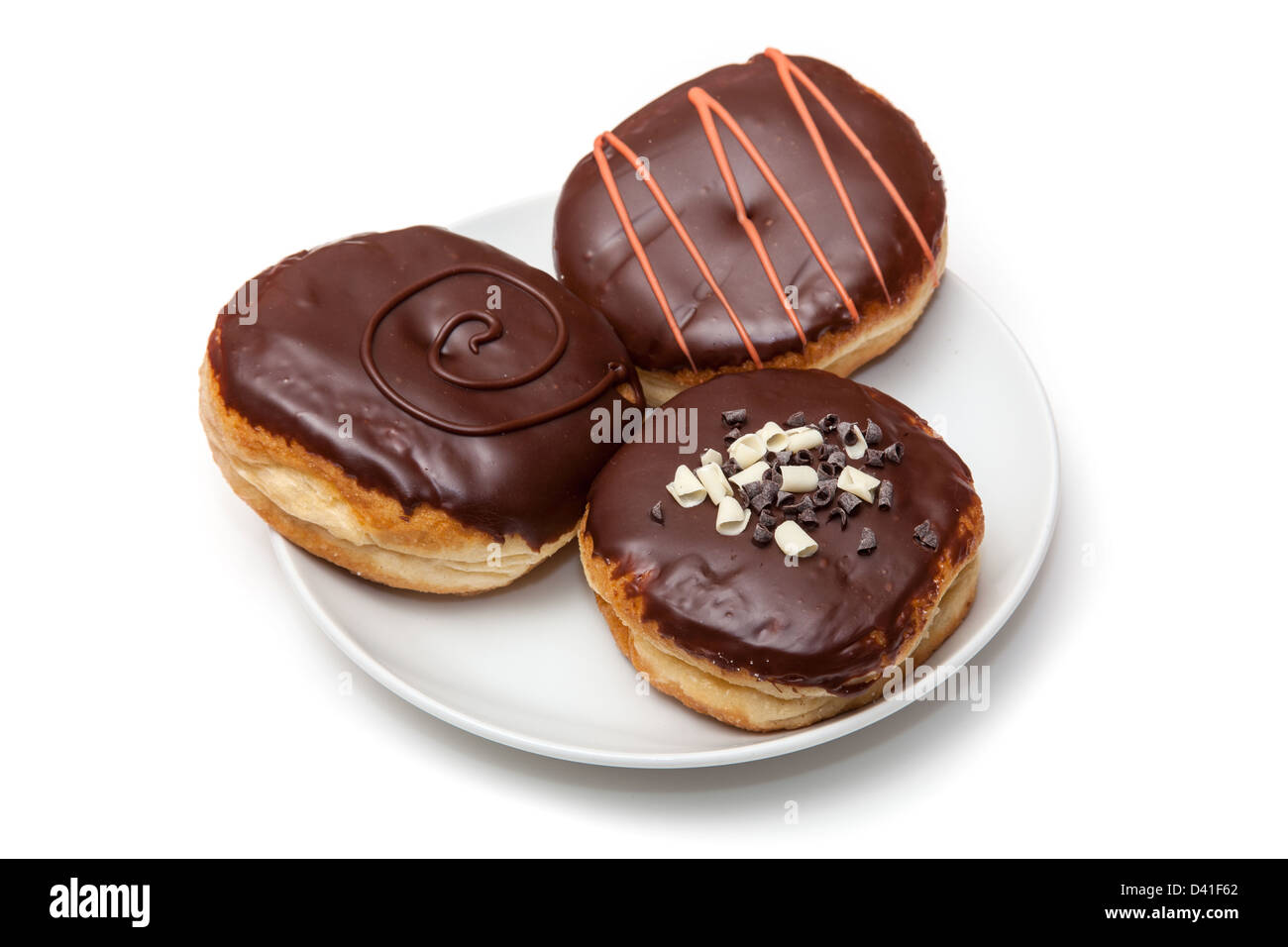 Iced chocolate donuts isolated on a white studio background Stock Photo ...
