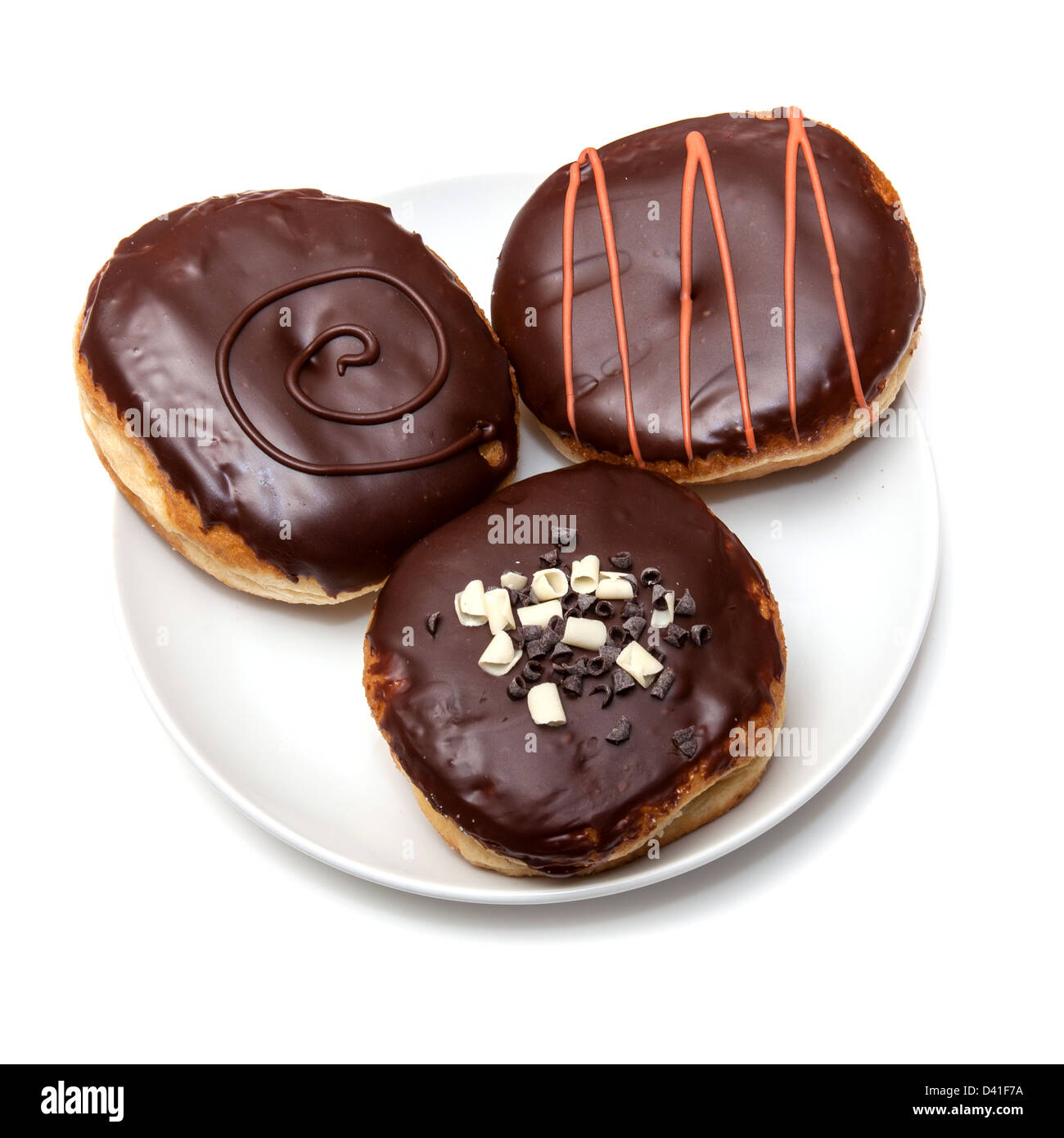 Iced chocolate donuts isolated on a white studio background Stock Photo ...