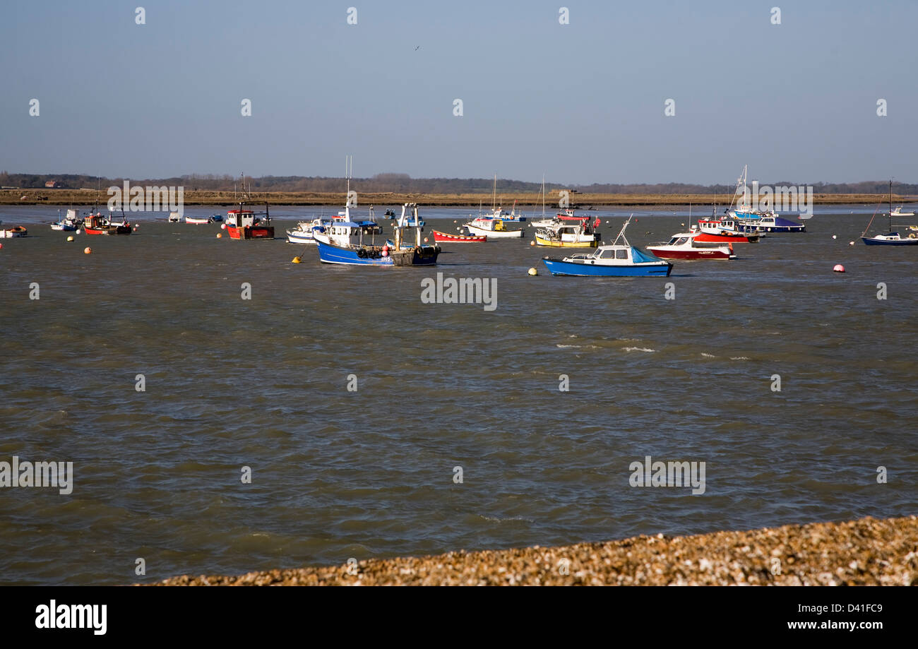 Boats at moorings at the mouth of the River Deben, Felixstowe Ferry, Suffolk, England Stock Photo