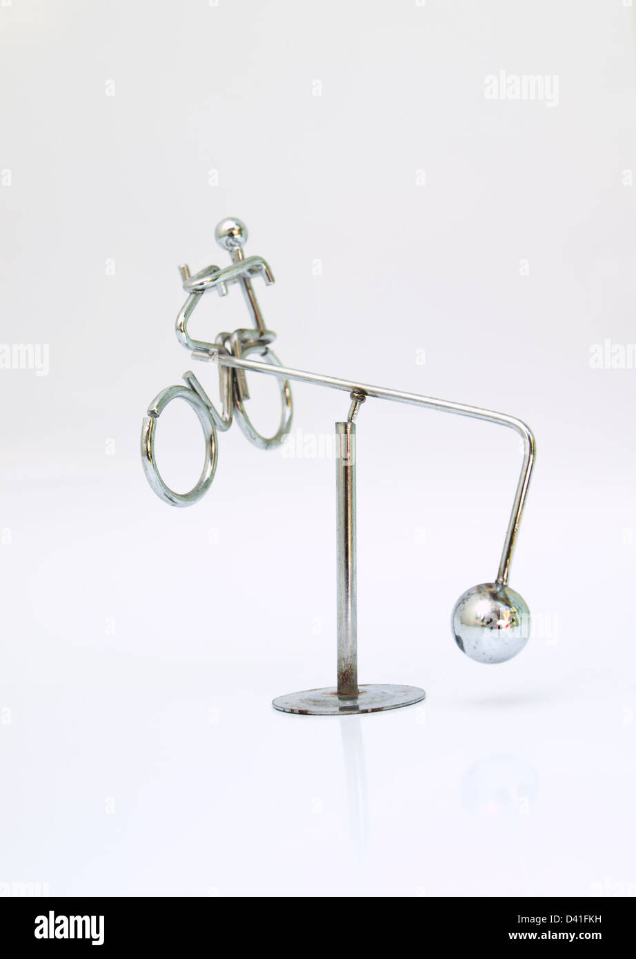 A Newtonian demonstrator momentum isolated on white Stock Photo Alamy