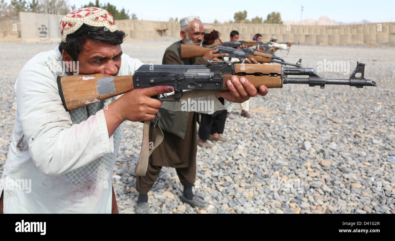 Afghan Local Police officers practice firing AK-47 rifles during training  February 17, 2013 in the Arghandab district, Kandahar province, Afghanistan  Stock Photo - Alamy