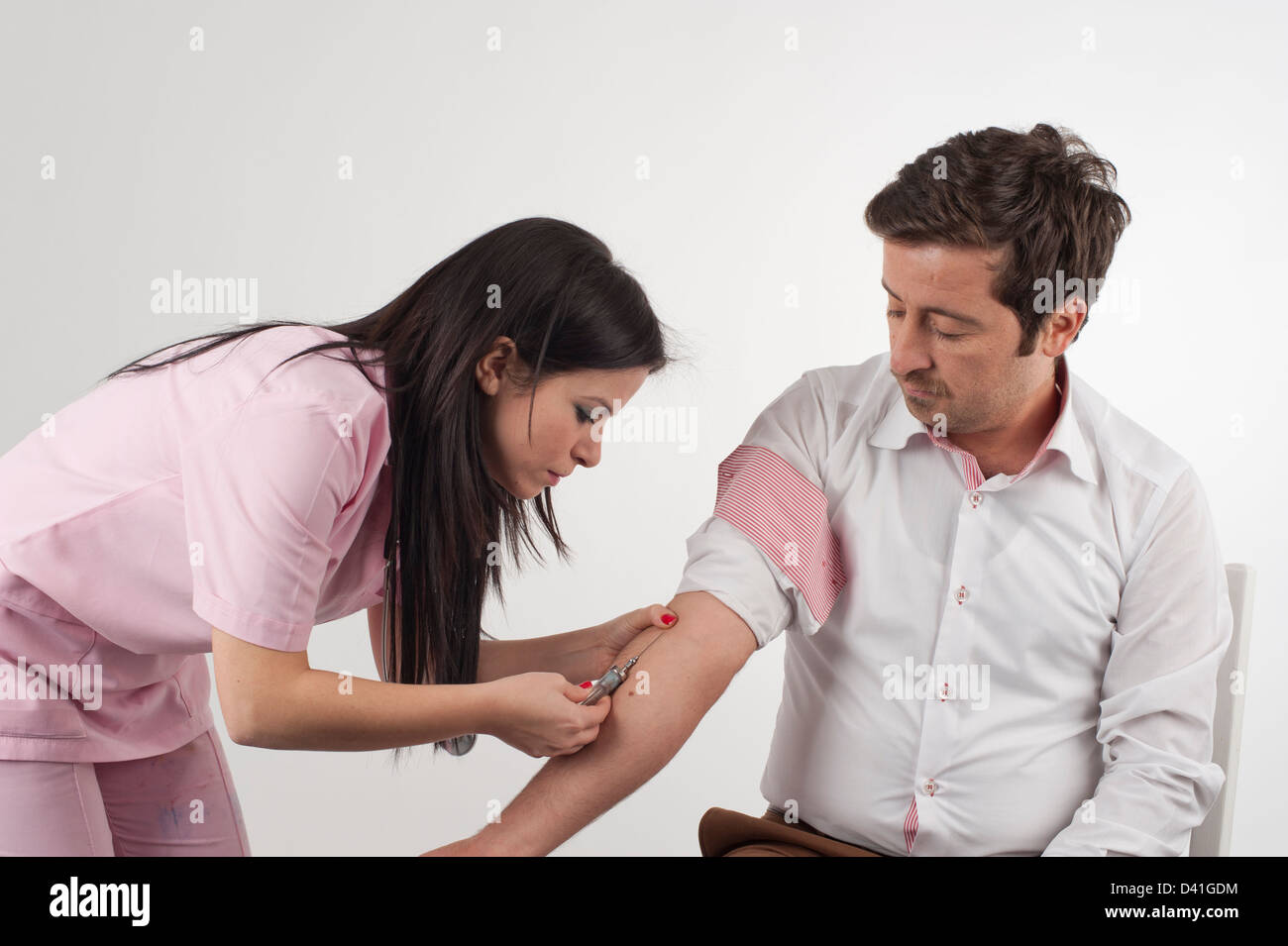Injecting injection hi-res stock photography and images - Alamy