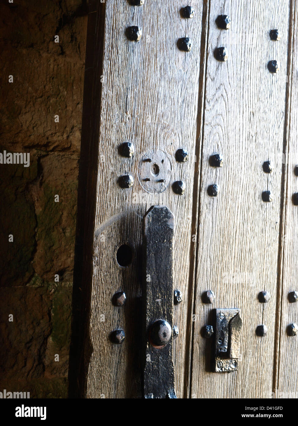 Old oak wooden studded door hi-res stock photography and images - Alamy