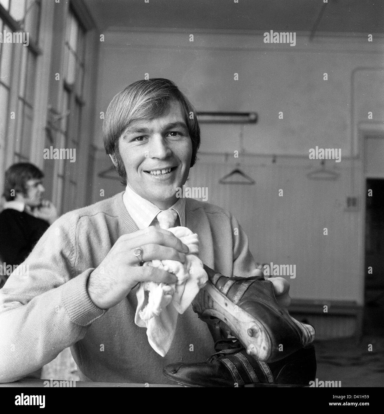 Ian Ross Aston Villa footballer cleaning his boots1971 Stock Photo