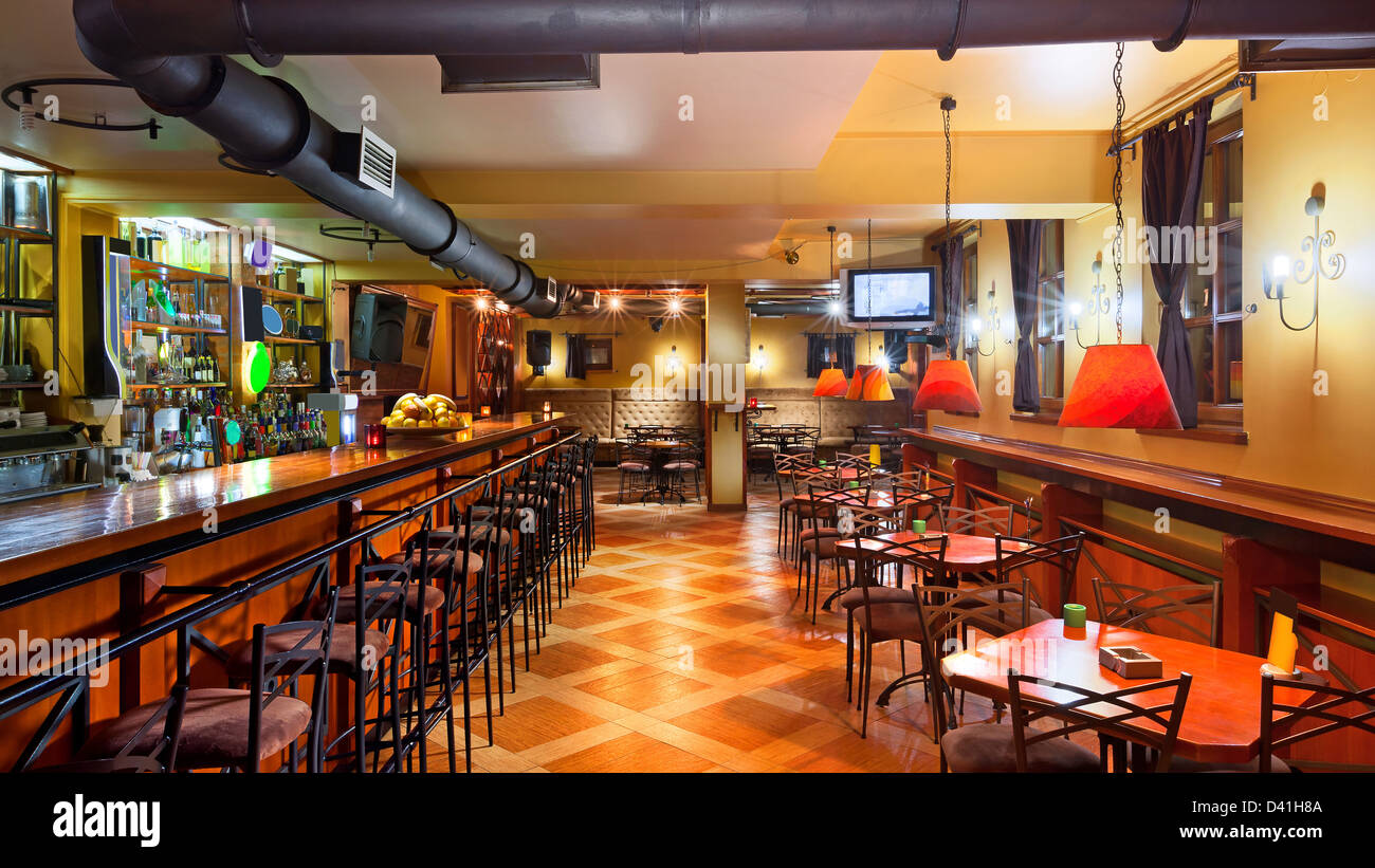 Interior Of A Modern Pub In Orange And Wooden Colors Stock