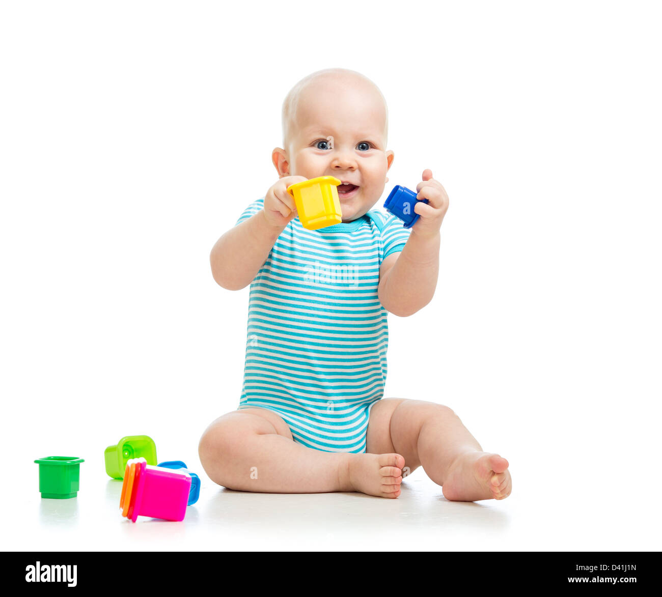 Cute little child is playing with toys isolated over white Stock Photo ...