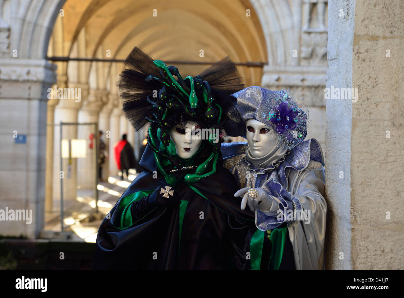Masks close to the Ponte dei Sospiri 'Bridge of sighs' during 2013 carnival; Venice; Veneto, Italy. Stock Photo