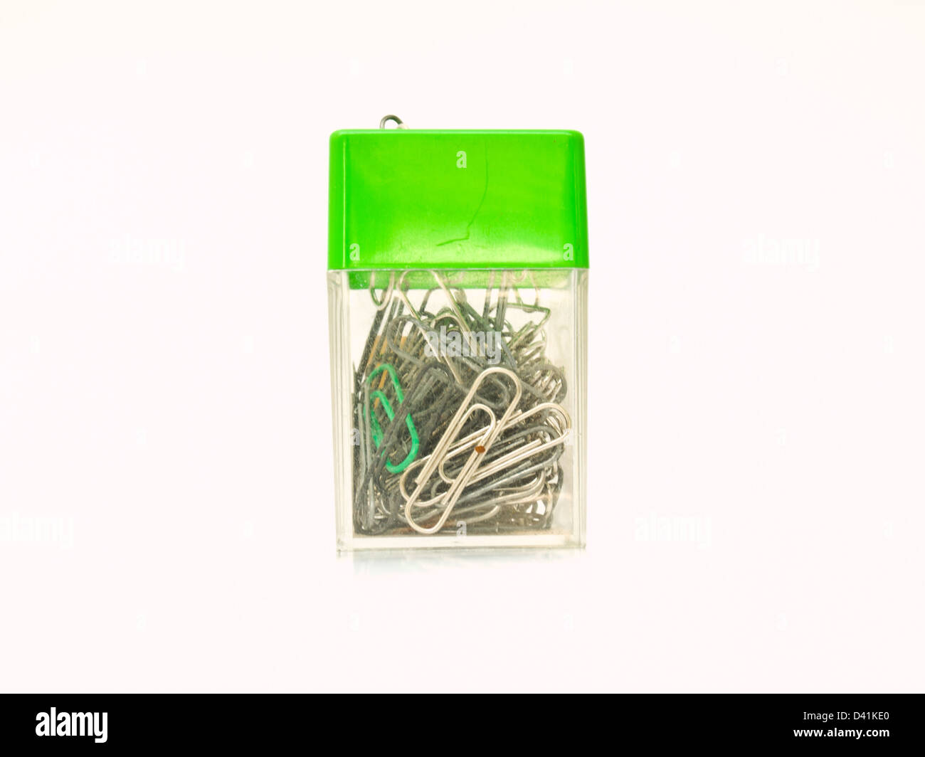 Used metal paper clips in used plastic container Stock Photo Alamy