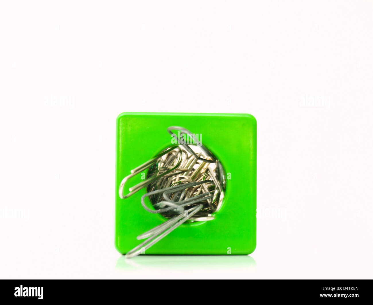 Used metal paper clips in used plastic container Stock Photo Alamy