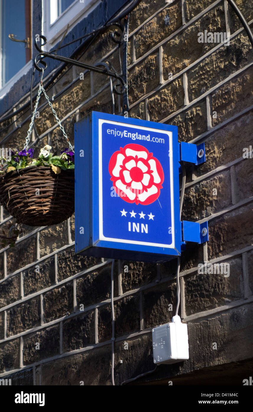 Close up of enjoyEngland.com rosette sign outside a small hotel and pub in Yorkshire, UK Stock Photo