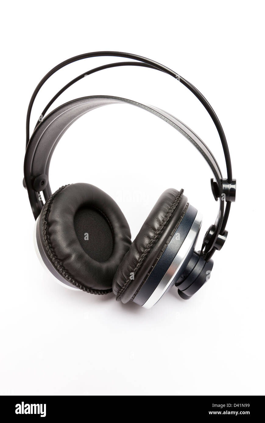 Full-sized, professional headphones against a white background. Stock Photo