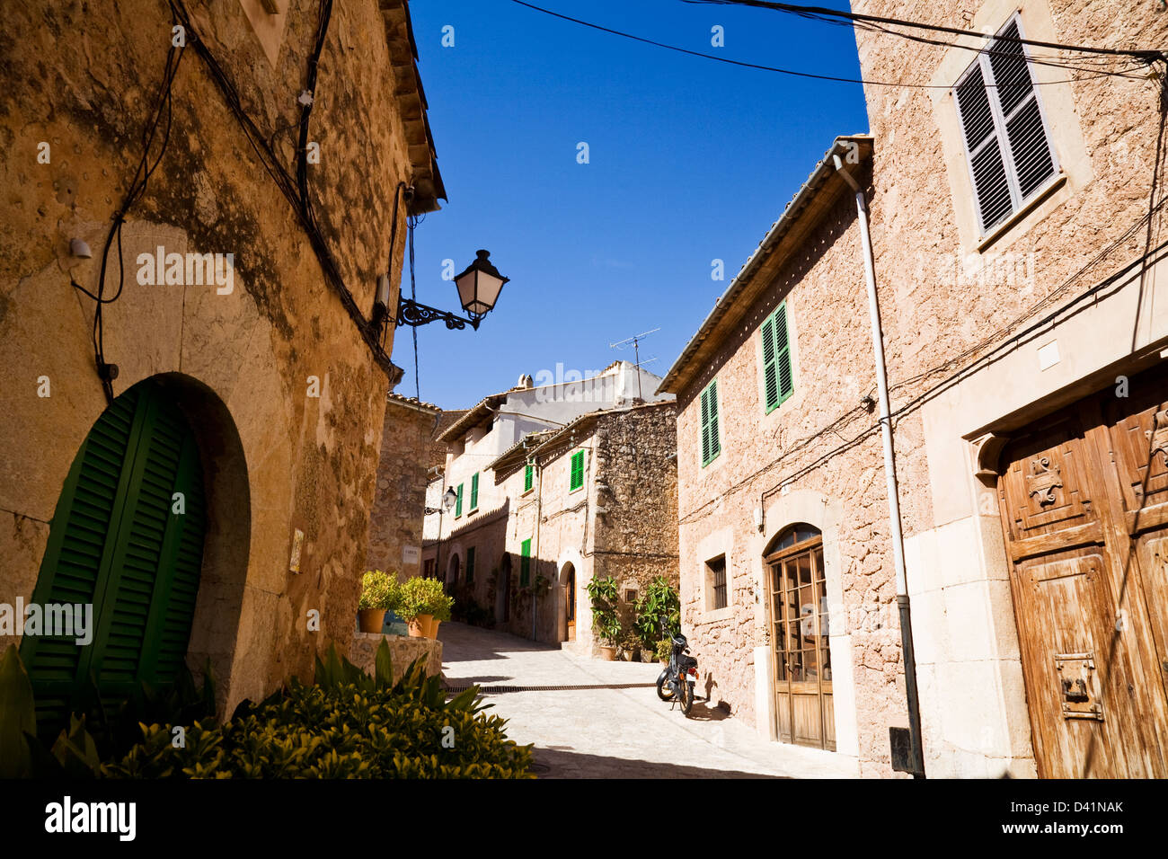 Typical, old Spanish houses and street in Valldemossa, Majorca, Spain Stock Photo
