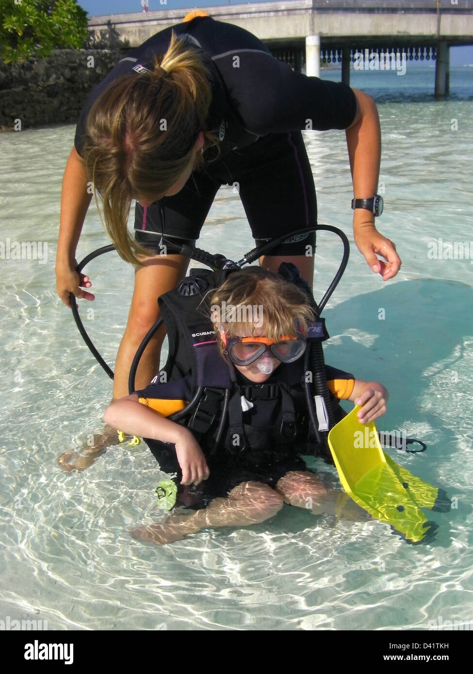 Learning to scuba dive with equipment, Kuda Hura Stock Photo