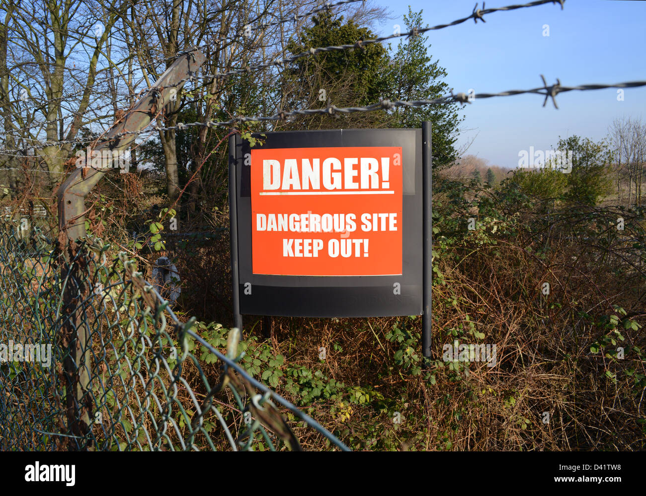 keep out warning sign of dangerous industrial site leeds yorkshire united kingdom Stock Photo