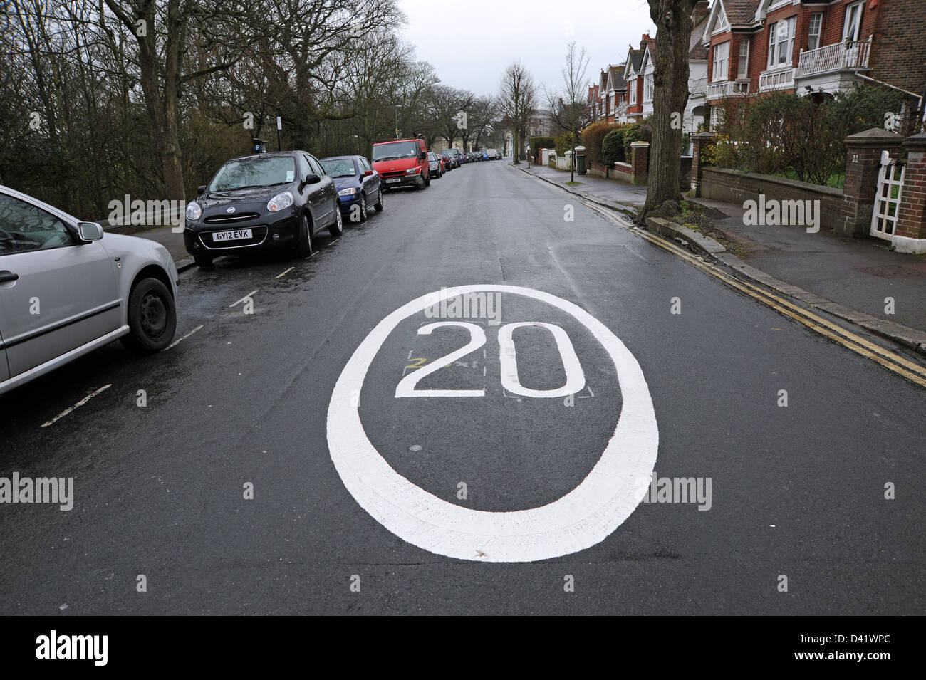 20 mph speed limit road marking signs on the streets of Brighton UK Stock Photo