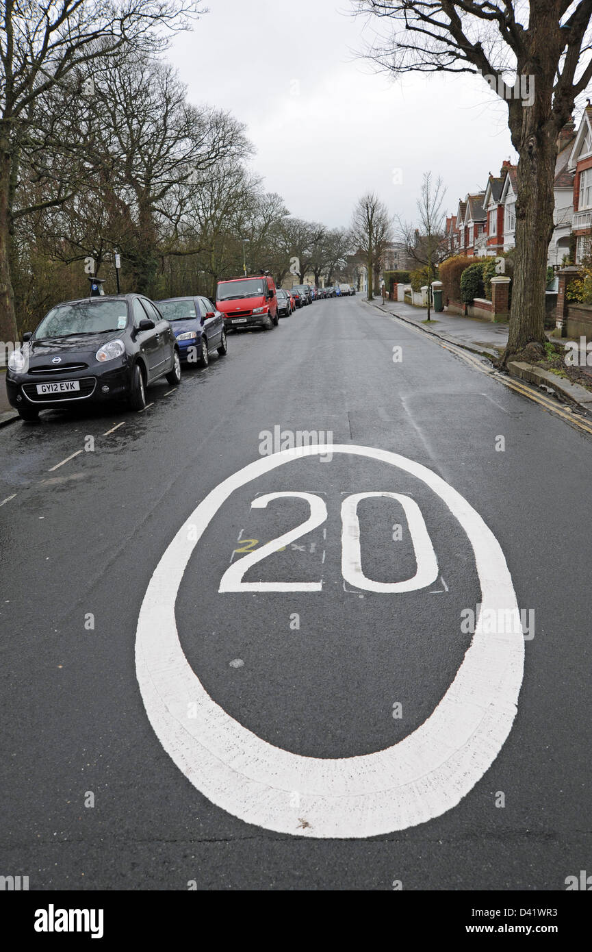 20 mph speed limit road marking signs on the streets of Brighton UK Stock Photo