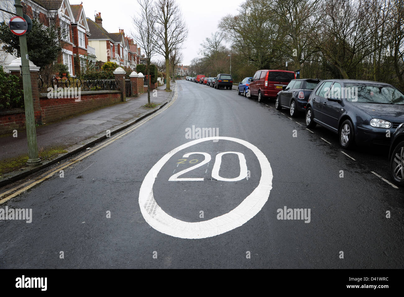 20 mph speed limit road marking signs on the streets of Brighton UK Stock Photo