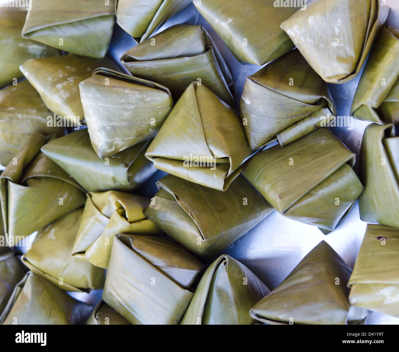 Sweet sticky rice in banana leaf package Stock Photo - Alamy