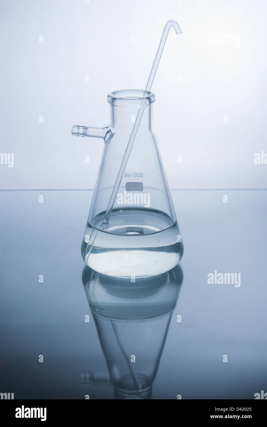 Test-tube with blue liquid isolated on white Stock Photo - Alamy