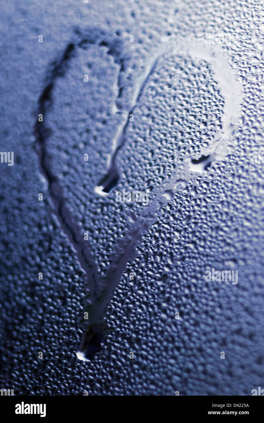 Heart shape in condensation Stock Photo