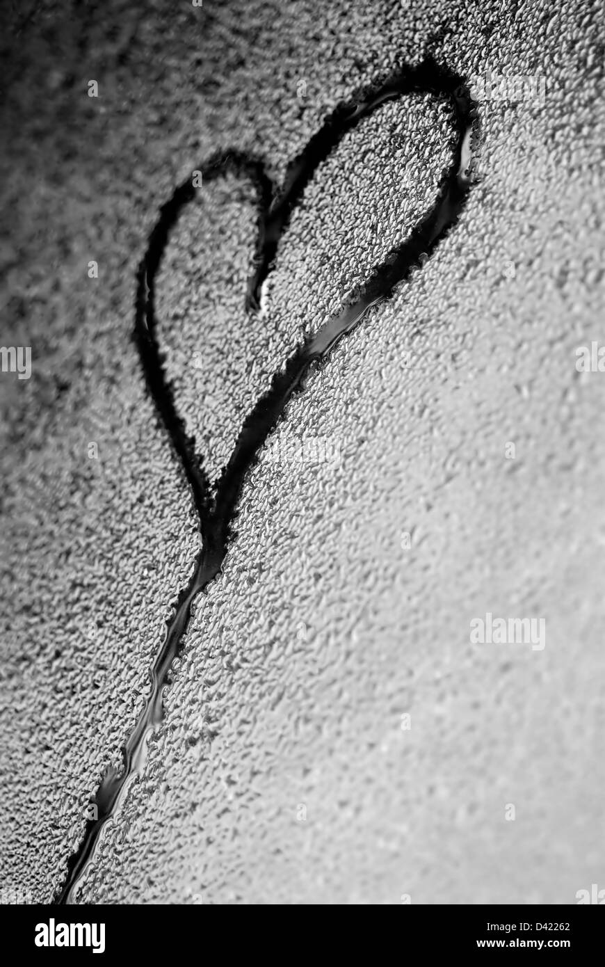 Heart shape in condensation Stock Photo