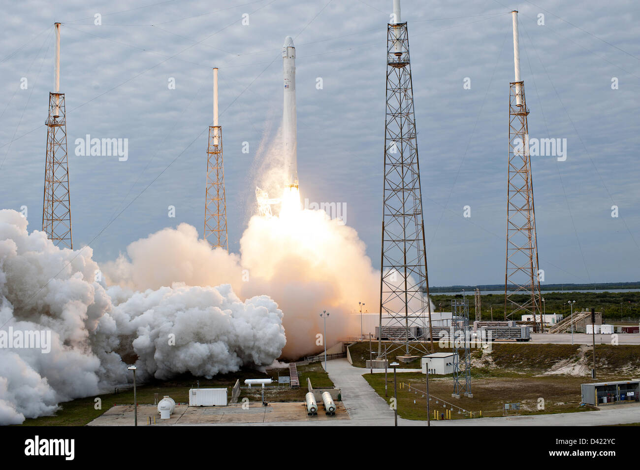 The SpaceX Falcon 9 commercial launch rocket blasts off with the Dragon ...