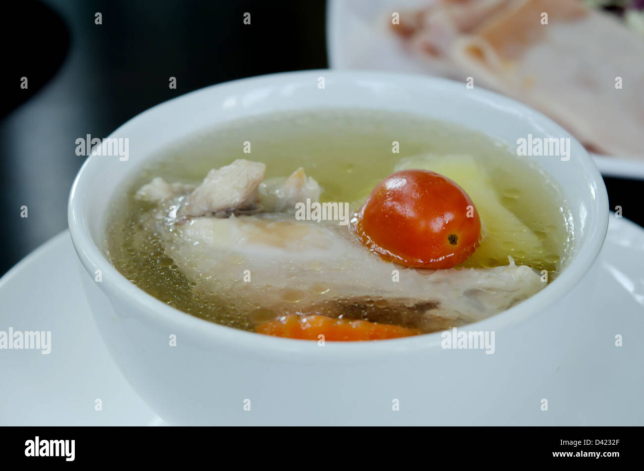 clear soup with chicken and vegetables Stock Photo Alamy