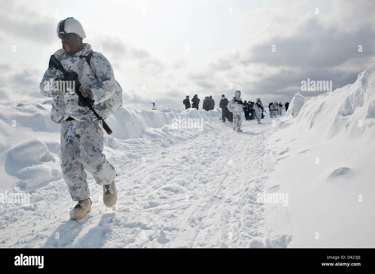US Marines during winter exercises at the Hokkaido-Dai Maneuver Area February 26, 2013 in Hokkaido prefecture, Japan. The exercises are a joint training operation with Japan and the US under winter conditions. Stock Photo