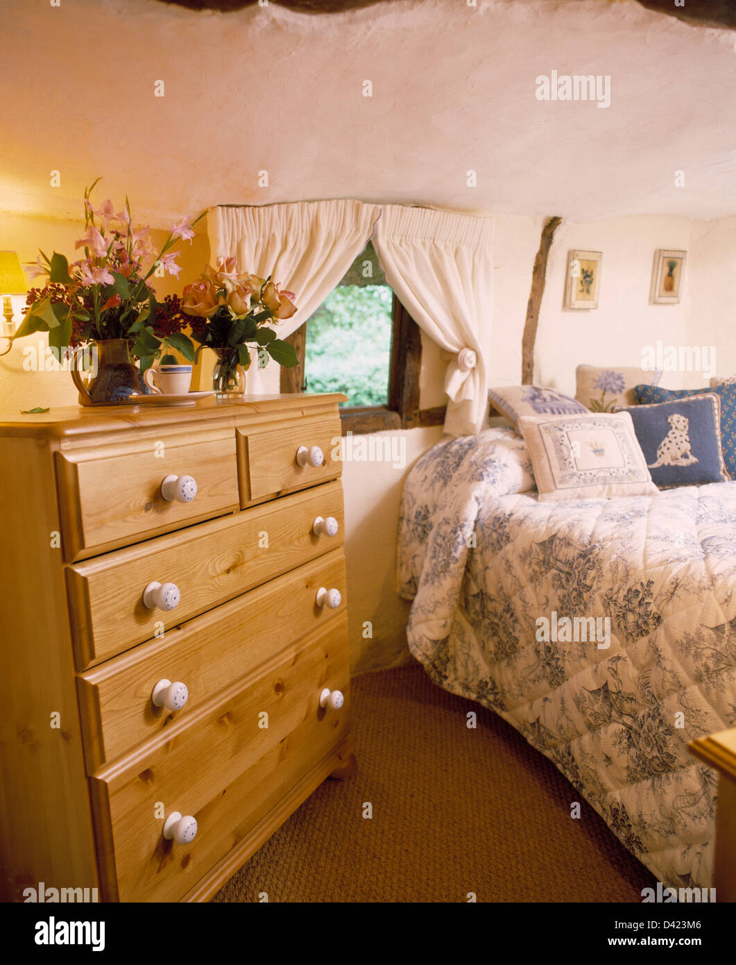 Pine Chest Of Drawers In Small Cottage Bedroom With Blue White