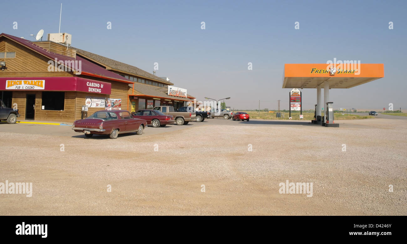 Blue sky view old Plymouth coupe and cars, Fresh Start Truck Stop filling station, Highway 18