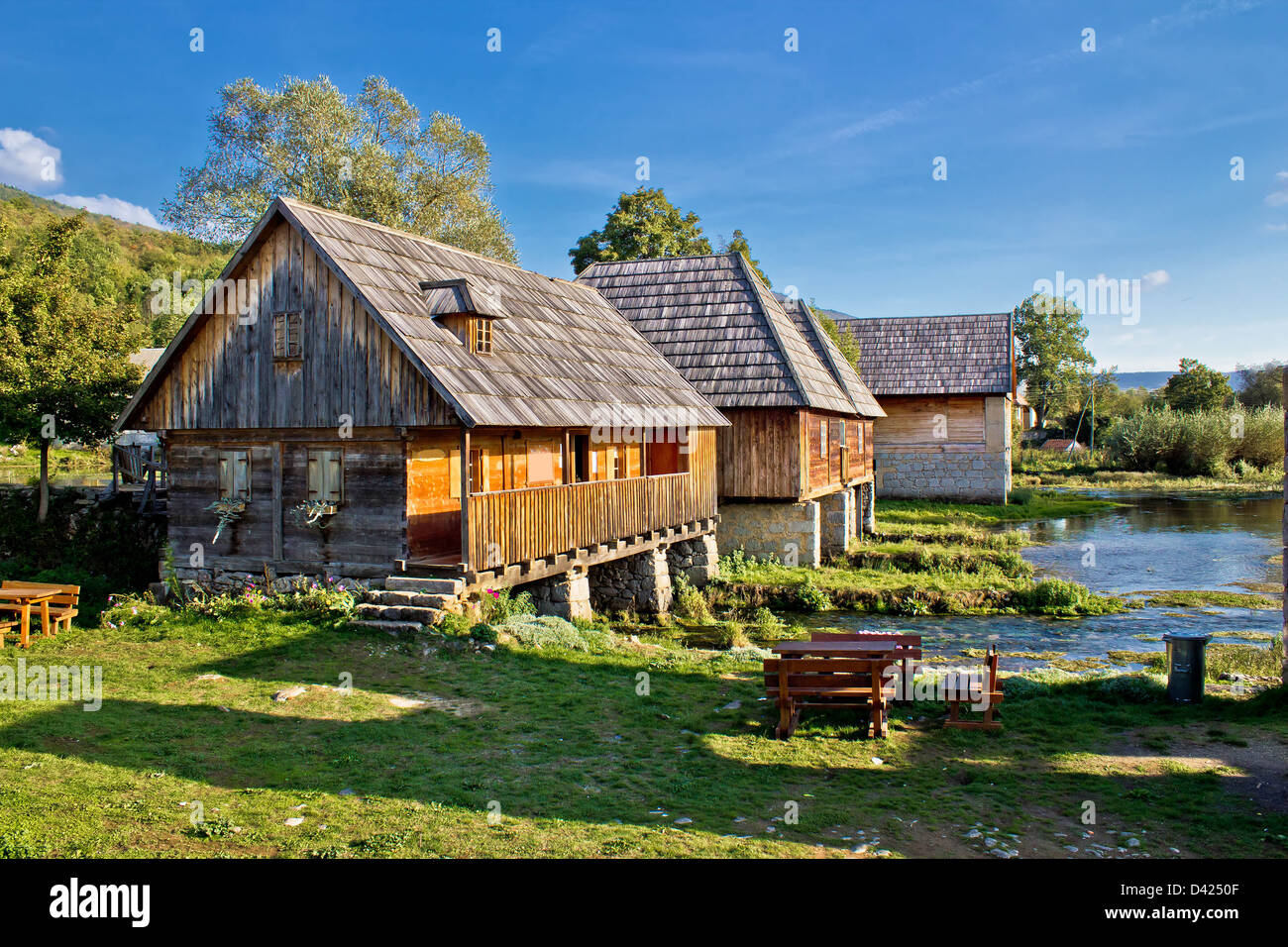 Old historic village with wooden cottages on Gacka river source, Majerovo vrilo, Lika, Croatia Stock Photo