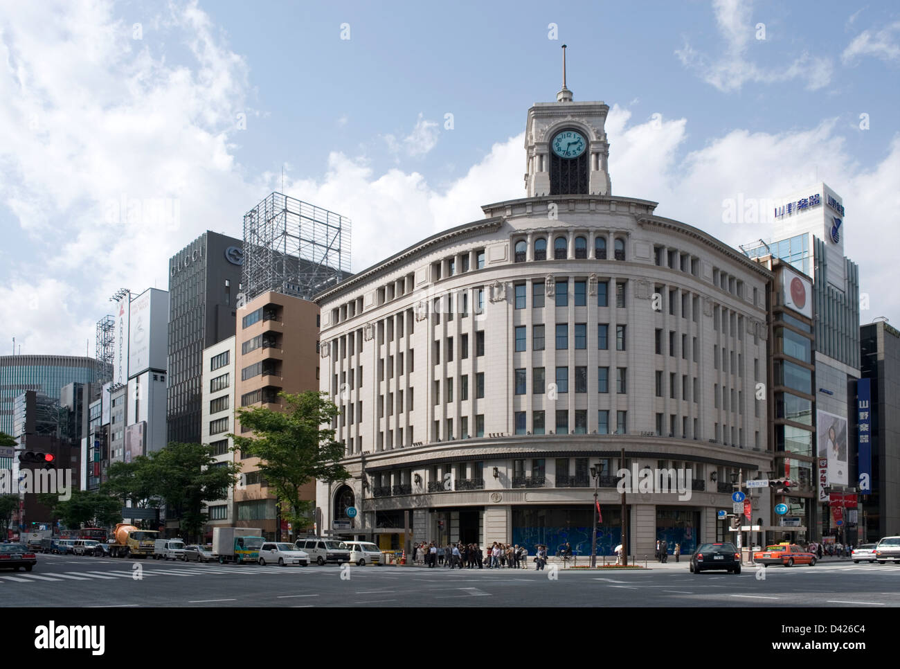 The 1932 Wako Building with landmark clock tower at intersection of Harumi-dori and Chuo-dori Streets in Ginza, Tokyo. Stock Photo