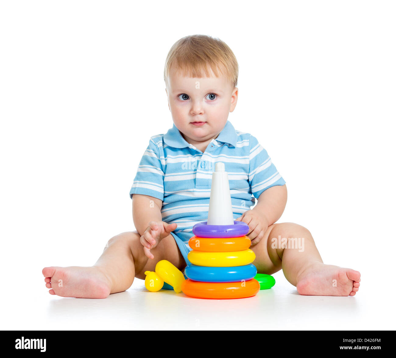 funny baby boy playing with colorful toy isolated on white Stock Photo
