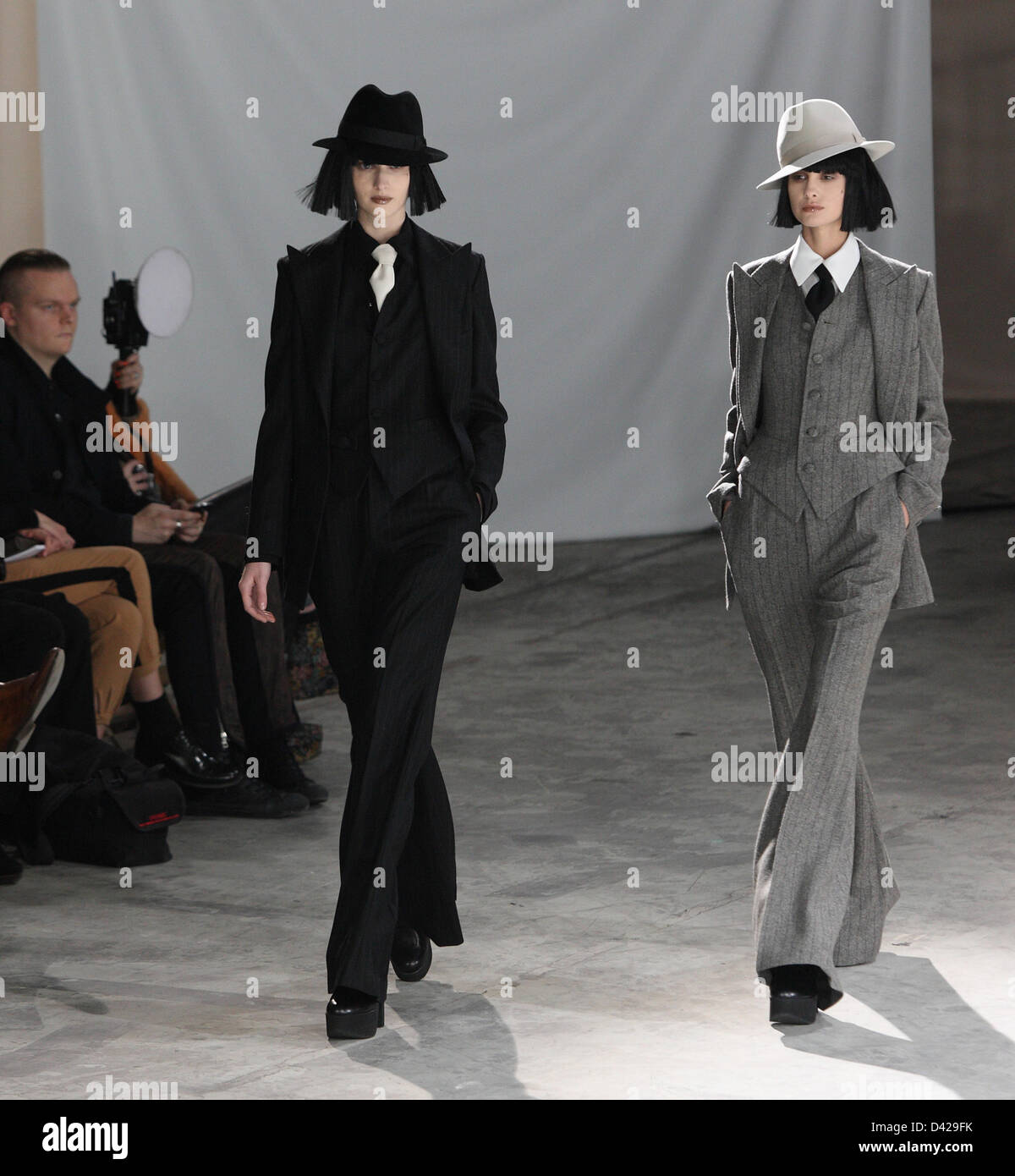 Paris, France. 1st March 2013. Models wear creations by Japanese designer Yohji Yamamoto as part of his fall/winter 2013/2014 collection presented during Paris pret-a-porter fashion week, Paris, 1 March 2013. The Paris pret-a-porter fashion shows run until 6 March 2013. Photo: Hendrik Ballhausen/DPA/ALamy Live News Stock Photo