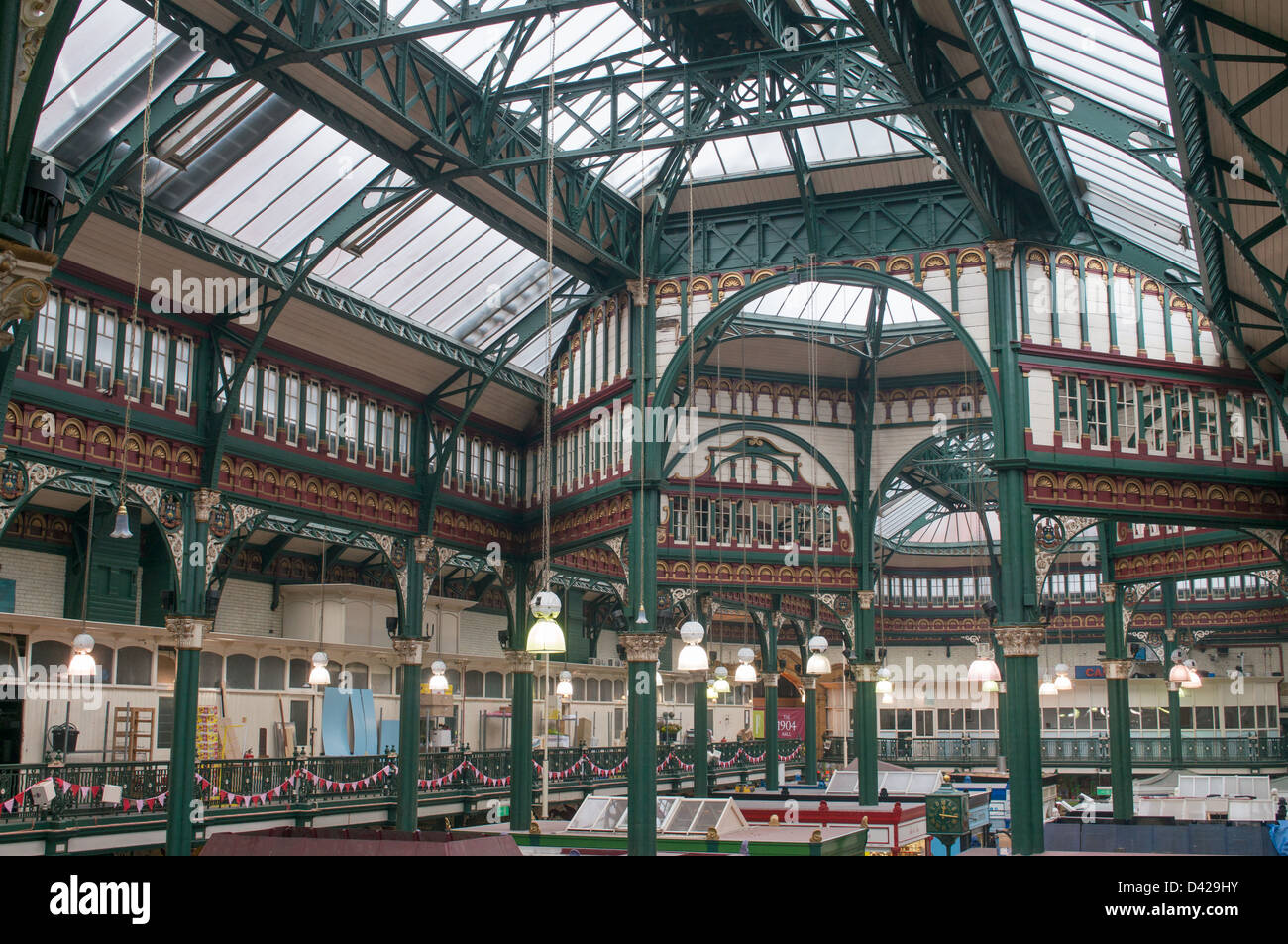 The decorative cast and wrought iron glazed roof structure within ...