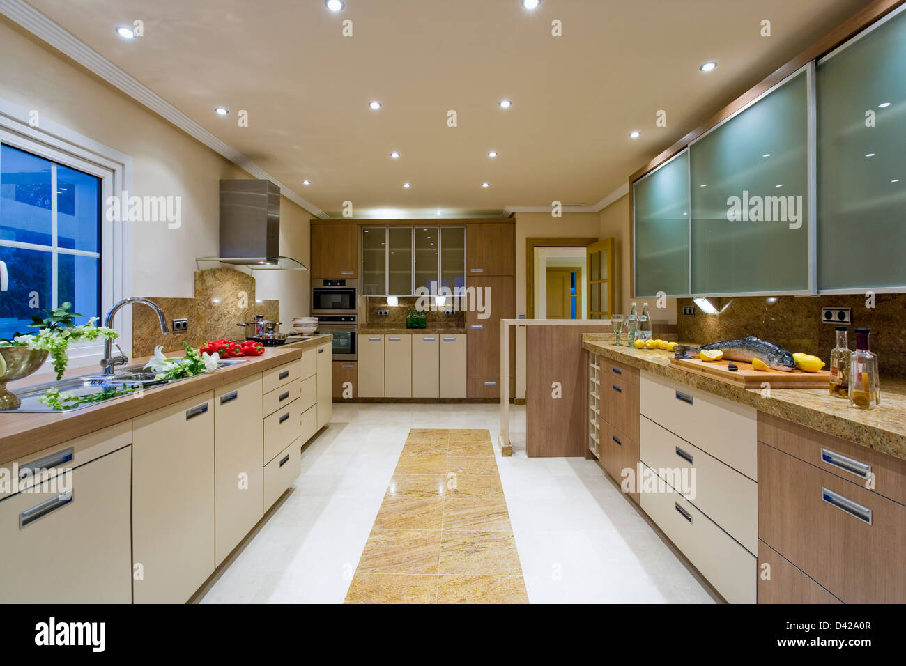 Large Modern Kitchen In Spanish Villa With Recessed Ceiling Lights