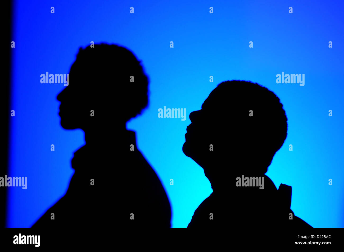 Berlin, Germany, silhouette, Africans listen to a concert Stock Photo