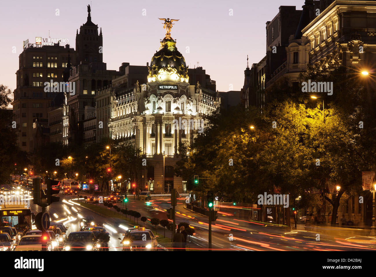 Madrid, Spain, the Edificio Metropolis evening on the Gran Via, in the foreground traffic Stock Photo