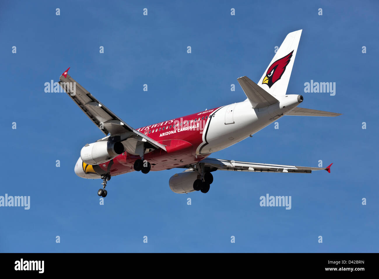 Airbus A319 of US Airways on final approach - special Arizona Cardinals scheme Stock Photo