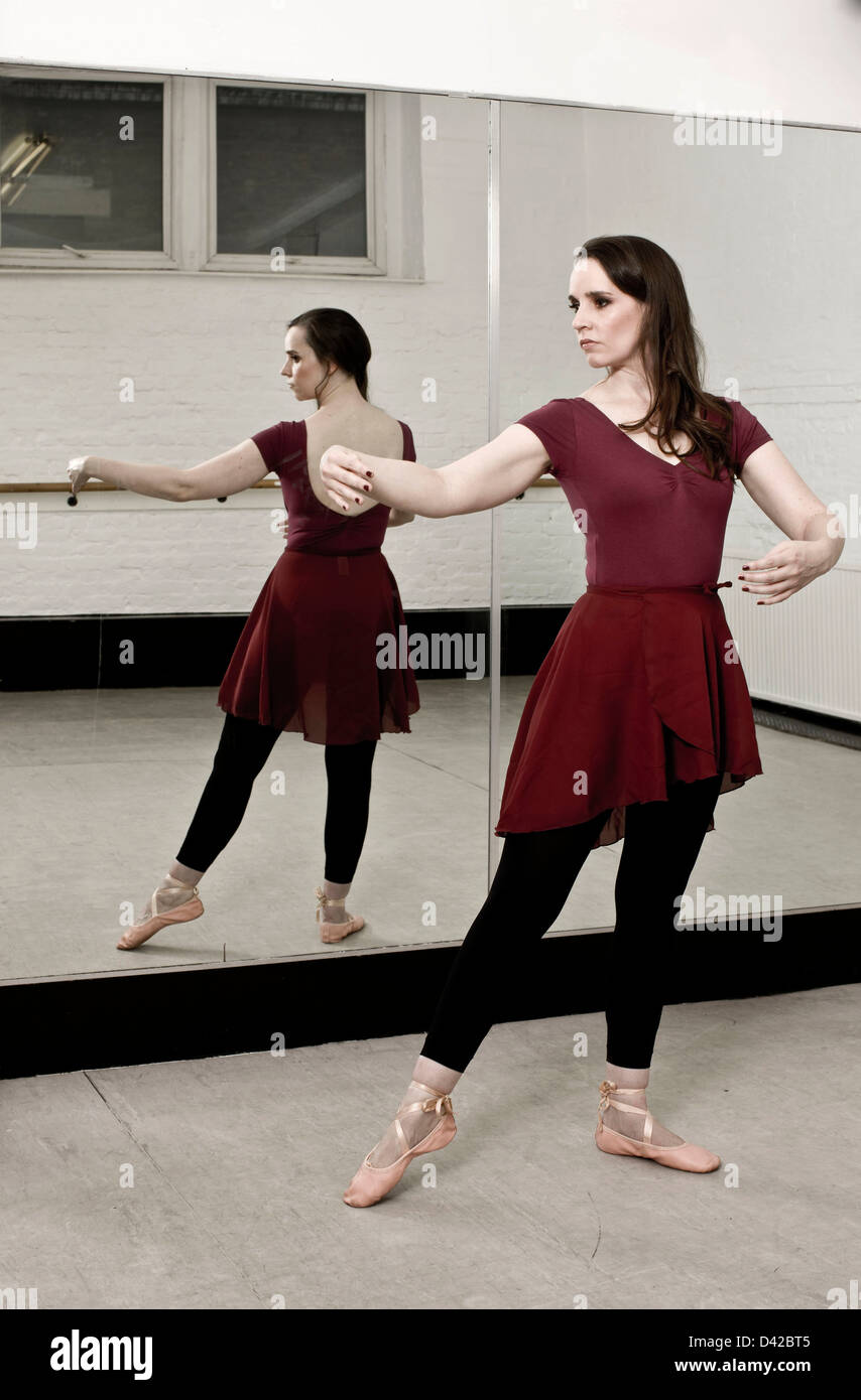 Ballet dancer holding position in mirror Stock Photo Alamy