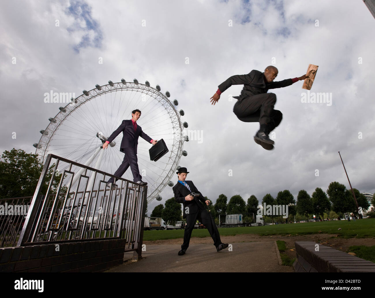 Parkour in suits, corporate risk, London Stock Photo
